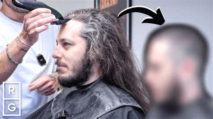 He Must Be Expelled – Reactions As Popular Student Invites Barber To Trim His Hair In Class (VIDEO)